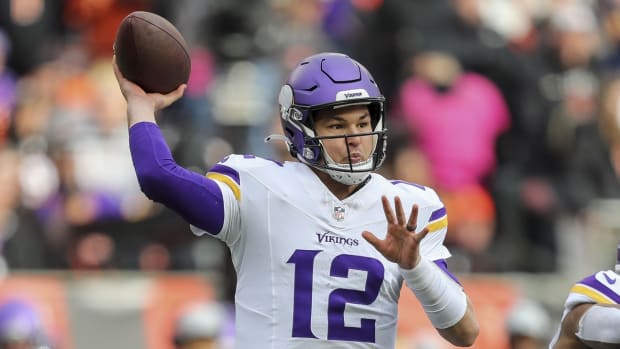 Dec 16, 2023; Cincinnati, Ohio, USA; Minnesota Vikings quarterback Nick Mullens (12) throws a pass against the Cincinnati Bengals in the first half at Paycor Stadium.